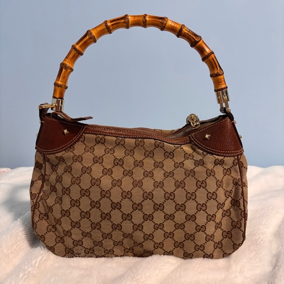 Gucci
Gucci Beige/Brown Canvas and Leather Bamboo Handle Top Handle Bag - Picture 3 of 9